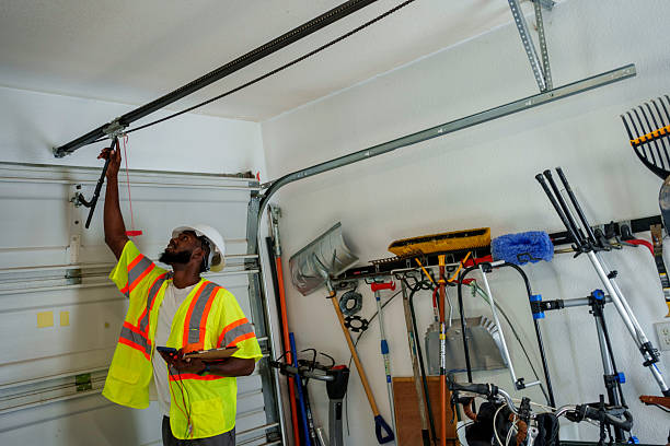 Professional Garage Door Panel Replacement technician working in West Mayfield, PA